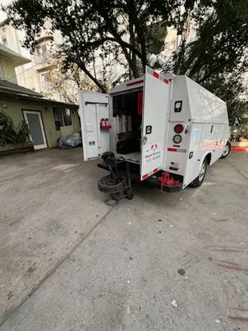 Magnet Plumbing service vehicle on-site for Grease Trap Cleaning in New Horizons South Bay